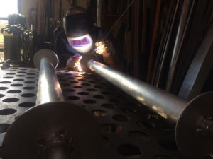 Matt Z weldig the scrolls for the crankie